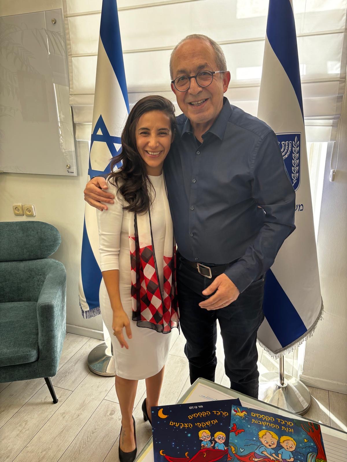 Director General of Israel’s Ministry of Education Meir Shimoni with author Mor Ben Zaken and the Magic Carpet books